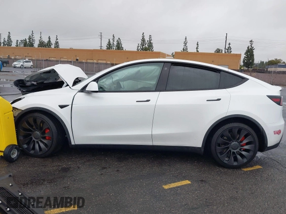 2022 Tesla Model Y Performance with VIN 7SAYGDEFXNF384268, listed as a IAAI auction lot 41558359 with 33,870 mi miles and . Bid and sale history available at DreamBid. Image 13.