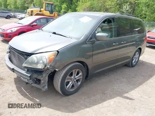 2008 Honda Odyssey Touring with VIN 5FNRL38908B100051, listed as a IAAI auction lot 42110484 with 190,567 mi miles and . Bid and sale history available at DreamBid. Image 2.