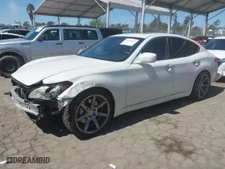 2013 Infiniti M37 with VIN JN1BY1AP6DM511104, listed as a IAAI auction lot 41818184 with 138,605 mi miles. Bid and sale history available at carsss.com. Image 2.