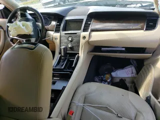 2016 Ford Taurus Limited z VIN 1FAHP2F86GG104703, wystawiony jako Copart lot #52086535 z przebiegiem Nie podano mil oraz Szkoda całkowita • Salvage title. Historia ofert i sprzedaży dostępna na DreamBid. Obrazek 8.