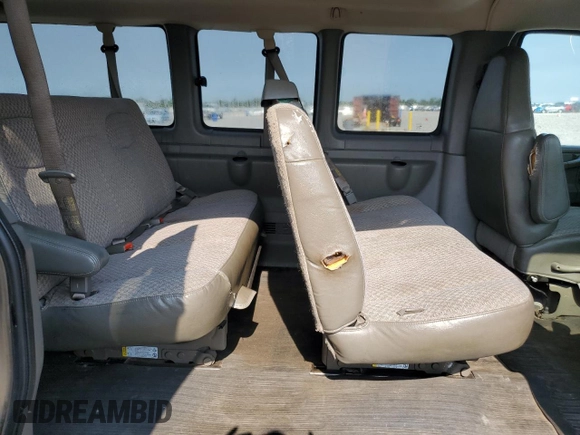 2004 Chevrolet Express Passenger with VIN 1GAHG39U741128458, listed as a Copart auction lot 64436215 with 118,387 mi miles and Salvage title. Bid and sale history available at DreamBid. Image 11.