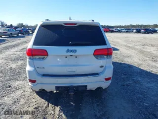 2014 Jeep Grand Cherokee Overland with VIN 1C4RJFCG9EC587322, listed as a IAAI auction lot 41632299 with 161,779 mi miles. Bid and sale history available at carsss.com. Image 16.