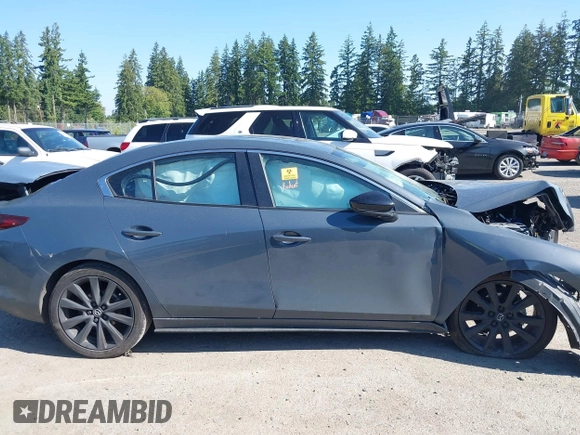 2023 Mazda 3 S Carbon Edition with VIN 3MZBPACM5PM376545, listed as a IAAI auction lot 42404054 with Not provided miles and . Bid and sale history available at DreamBid. Image 13.