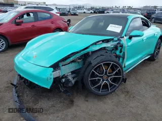 2022 Porsche Taycan 4S z VIN WP0AB2Y12NSA45396, wystawiony jako IAAI lot #41946433 z przebiegiem 9389 mil mil oraz . Historia ofert i sprzedaży dostępna na DreamBid. Obrazek 6.