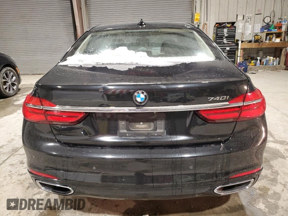 2017 BMW 7 Series 740i with VIN WBA7E2C3XHG741046, listed as a Copart auction lot 45382705 with 99,065 mi miles and Salvage Title. Bid and sale history available at carsss.com. Image 6.