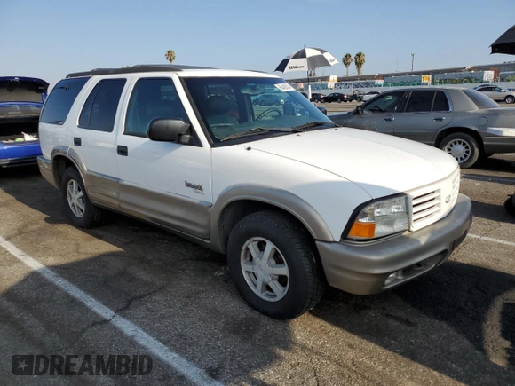 2000 Oldsmobile Bravada z VIN 1GHDT13W7Y2351268, wystawiony jako Copart lot #66408824 z przebiegiem 134 512 mil mil oraz Tytuł czysty. Historia ofert i sprzedaży dostępna na DreamBid. Obrazek 4.