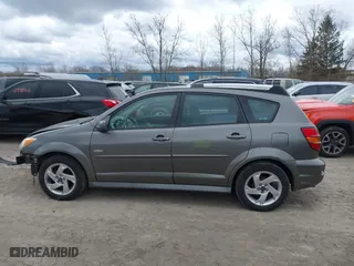 2007 Pontiac Vibe with VIN 5Y2SL65837Z414154, listed as a IAAI auction lot 42033597 with 121,728 mi miles. Bid and sale history available at carsss.com. Image 14.
