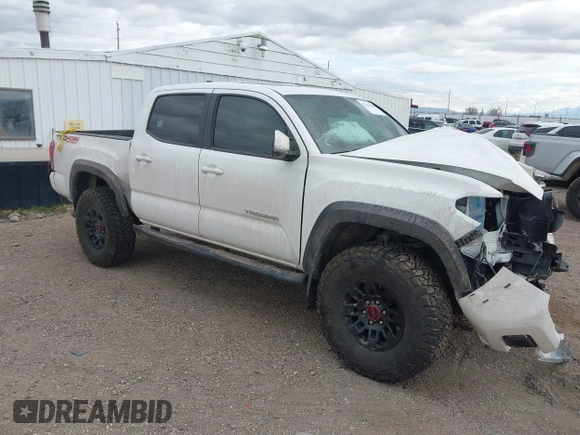 2017 Toyota Tacoma SR5 z VIN 3TMCZ5AN8HM077203, wystawiony jako IAAI lot #41765910 z przebiegiem 170 863 mil mil oraz . Historia ofert i sprzedaży dostępna na DreamBid. Obrazek 1.