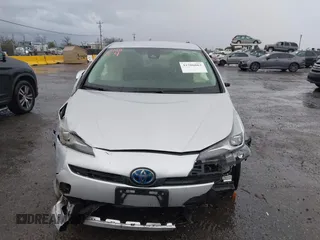 2022 Toyota Prius L Eco with VIN JTDKAMFU1N3177055, listed as a IAAI auction lot 41506862 with 121,318 mi miles and . Bid and sale history available at DreamBid. Image 13.