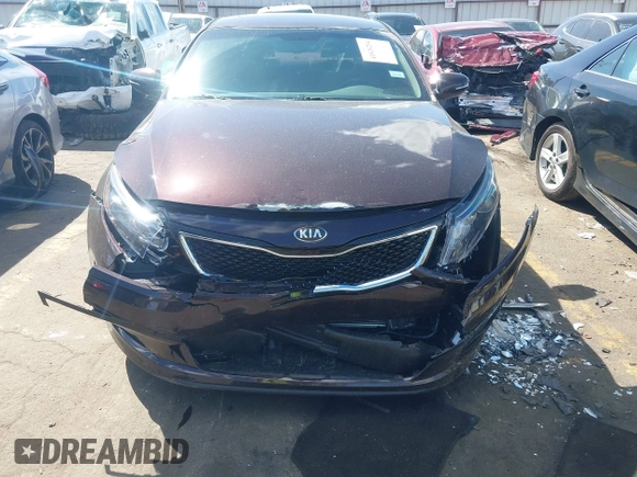 2015 Kia Optima LX z VIN 5XXGM4A71FG463939, wystawiony jako IAAI lot #41838294 z przebiegiem 70 274 mil mil oraz . Historia ofert i sprzedaży dostępna na DreamBid. Obrazek 6.