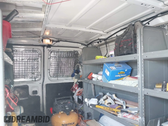 2012 Ford Econoline Cargo Commercial with VIN 1FTNE1EW7CDB08722, listed as a IAAI auction lot 41703842 with 252,175 mi miles and . Bid and sale history available at carsss.com. Image 17.