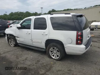 2011 GMC Yukon SLE with VIN 1GKS2AE01BR166466, listed as a Copart auction lot 62555454 with 199,634 mi miles and Salvage Title. Bid and sale history available at carsss.com. Image 2.
