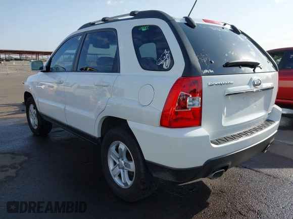 2009 Kia Sportage LX with VIN KNDJF723197622517, listed as a IAAI auction lot 41771268 with 127,112 mi miles. Bid and sale history available at carsss.com. Image 3.