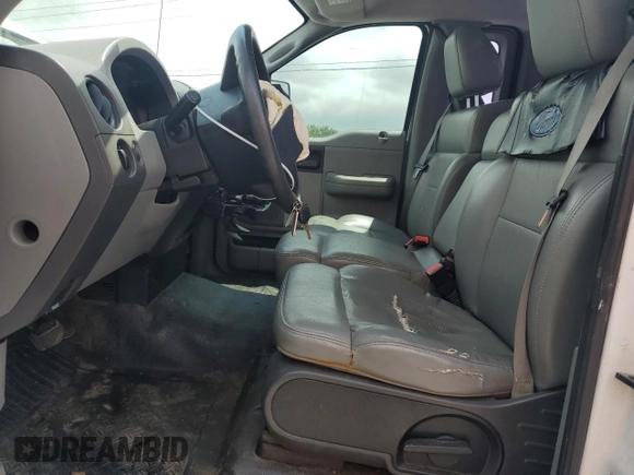 2007 Ford F-150 XL with VIN 1FTRF12W97KC13119, listed as a Copart auction lot 60927195 with 208,316 mi miles and Salvage title. Bid and sale history available at DreamBid. Image 7.