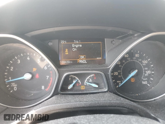 2015 Ford Focus SE with VIN 1FADP3F2XFL321208, listed as a Copart auction lot 61413005 with 139,439 mi miles and Salvage title. Bid and sale history available at DreamBid. Image 9.