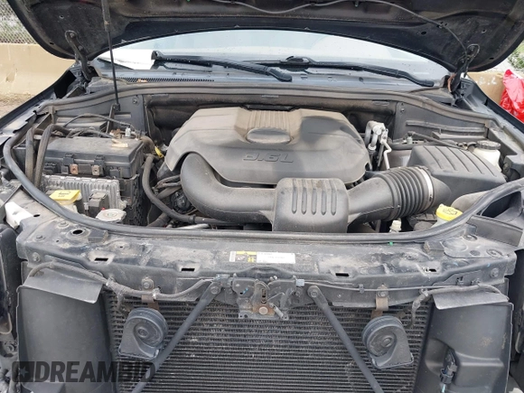 2015 Jeep Grand Cherokee Summit with VIN 1C4RJFJGXFC882787, listed as a IAAI auction lot 42098274 with 147,020 mi miles and . Bid and sale history available at DreamBid. Image 10.