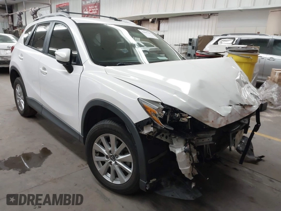 2016 Mazda CX-5 Sport with VIN JM3KE2BY8G0787130, listed as a IAAI auction lot 41847443 with 96,611 mi miles. Bid and sale history available at carsss.com. Image 1.