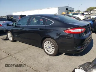 2013 Ford Fusion SE Hybrid with VIN 3FA6P0LU7DR363136, listed as a Copart auction lot 64764315 with 173,575 mi miles and Salvage title. Bid and sale history available at DreamBid. Image 2.