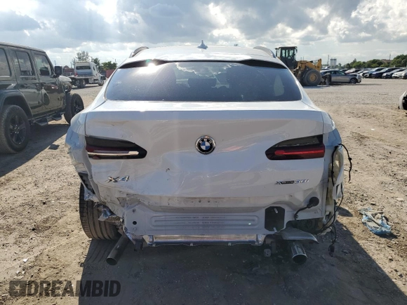 2021 BMW X4 xDrive30i with VIN 5UX2V1C0XM9E11002, listed as a Copart auction lot 67348653 with 27,805 mi miles. Bid and sale history available at carsss.com. Image 6.