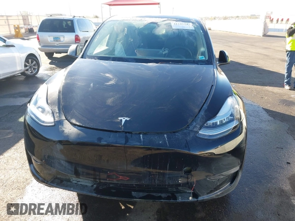 2023 Tesla Model Y Long Range with VIN 7SAYGDEE8PA151965, listed as a IAAI auction lot 41343497 with 25,869 mi miles. Bid and sale history available at carsss.com. Image 12.