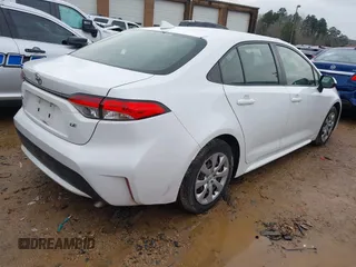 2020 Toyota Corolla LE with VIN JTDEPRAE5LJ027757, listed as a IAAI auction lot 41572041 with 199,146 mi miles. Bid and sale history available at carsss.com. Image 4.