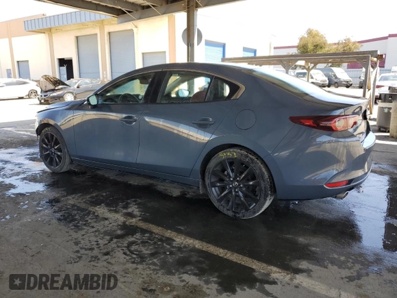 2024 Mazda 3 S Carbon Edition with VIN 3MZBPBCM7RM410798, listed as a Copart auction lot 52444015 with 17,150 mi miles and Non Repairable. Bid and sale history available at DreamBid. Image 2.