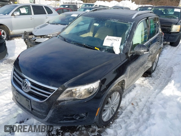 2011 Volkswagen Tiguan SE with VIN WVGBV7AX7BW515555, listed as a IAAI auction lot 41627913 with 49,424 mi miles and . Bid and sale history available at DreamBid. Image 2.