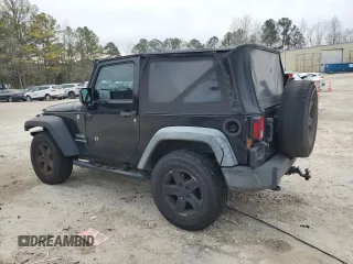 2012 Jeep Wrangler Sport with VIN 1C4GJWAG6CL167329, listed as a Copart auction lot 88895815 with 147,448 mi miles and Clean Title. Bid and sale history available at DreamBid. Image 2.