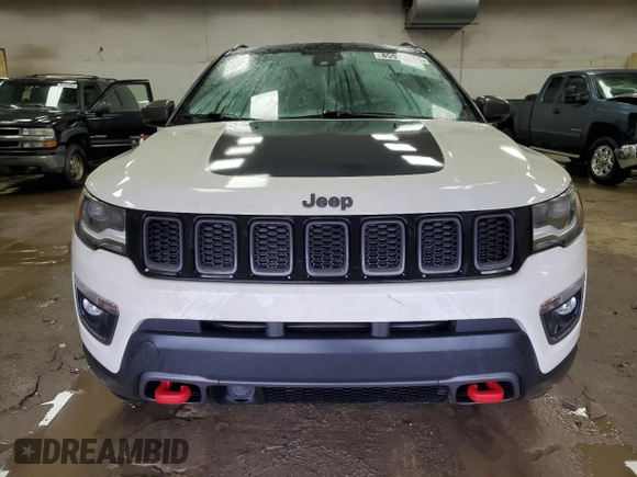 2018 Jeep Compass Trailhawk with VIN 3C4NJDDBXJT255622, listed as a Copart auction lot 85917244 with 73,388 mi miles and Clean Title. Bid and sale history available at carsss.com. Image 5.