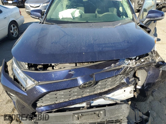2019 Toyota RAV4 XLE with VIN JTMP1RFV8KD513544, listed as a Copart auction lot 73611684 with Not Provided miles and Salvage Title. Bid and sale history available at DreamBid. Image 12.