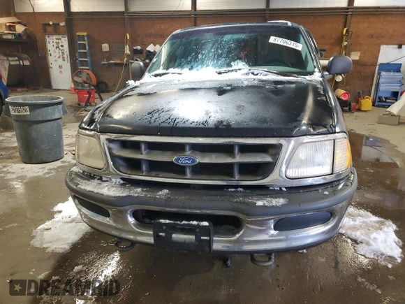 1997 Ford F-150 z VIN 1FTDF18W3VNC15218, wystawiony jako Copart lot #87706315 z przebiegiem 206 418 mil mil oraz Szkoda całkowita • Salvage title. Historia ofert i sprzedaży dostępna na DreamBid. Obrazek 5.