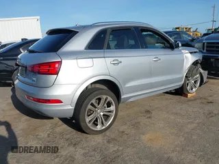 2017 Audi Q3 Premium Plus z VIN WA1JCCFSXHR000319, wystawiony jako IAAI lot #41986889 z przebiegiem 74 675 mil mil oraz . Historia ofert i sprzedaży dostępna na DreamBid. Obrazek 4.