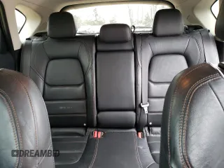 2019 Mazda CX-5 Grand Touring with VIN JM3KFADM0K1596256, listed as a Copart auction lot 86323594 with 118,853 mi miles and Salvage title. Bid and sale history available at DreamBid. Image 10.