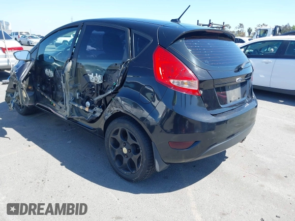2011 Ford Fiesta SES with VIN 3FADP4FJ9BM181965, listed as a IAAI auction lot 42092140 with 150,304 mi miles. Bid and sale history available at carsss.com. Image 3.