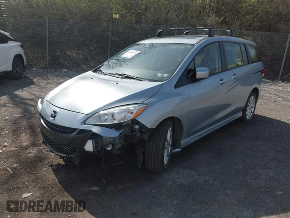 2012 Mazda 5 Grand Touring with VIN JM1CW2DL6C0138979, listed as a IAAI auction lot 41936188 with 57,963 mi miles and . Bid and sale history available at carsss.com. Image 12.