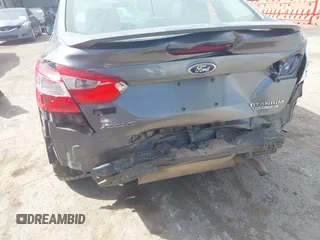2014 Ford Focus Titanium with VIN 1FADP3J21EL299718, listed as a IAAI auction lot 41788080 with 91,748 mi miles. Bid and sale history available at carsss.com. Image 6.