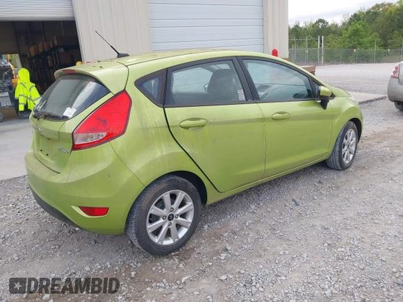 2011 Ford Fiesta SE with VIN 3FADP4EJXBM164397, listed as a IAAI auction lot 42046591 with 118,953 mi miles. Bid and sale history available at carsss.com. Image 4.