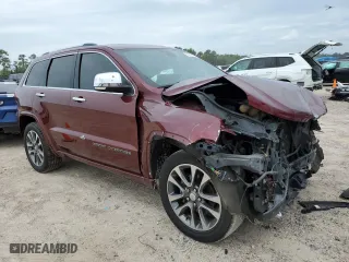 2017 Jeep Grand Cherokee Overland with VIN 1C4RJECG3HC868255, listed as a Copart auction lot 70207444 with 121,604 mi miles and Salvage Title. Bid and sale history available at carsss.com. Image 4.