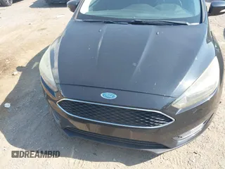 2015 Ford Focus SE z VIN 1FADP3F25FL284097, wystawiony jako IAAI lot #42553323 z przebiegiem 139 647 mil mil oraz . Historia ofert i sprzedaży dostępna na DreamBid. Obrazek 12.