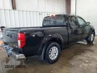 2018 Nissan Frontier SV with VIN 1N6AD0FVXJN702033, listed as a Copart auction lot 63436595 with 64,231 mi miles and Salvage title. Bid and sale history available at DreamBid. Image 3.