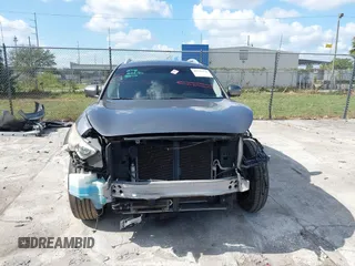 2013 Infiniti FX with VIN JN8CS1MU0DM140711, listed as a IAAI auction lot 40796518 with 179,386 mi miles and . Bid and sale history available at DreamBid. Image 13.