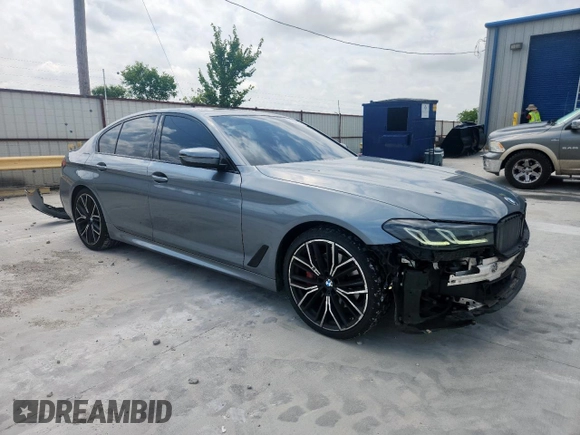 2022 BMW 5 Series 530i with VIN WBA53BH00NWX59634, listed as a Copart auction lot 61598505 with 69,130 mi miles and Salvage title. Bid and sale history available at DreamBid. Image 4.