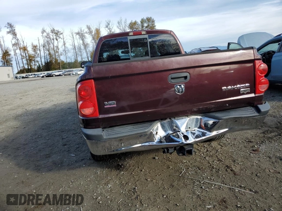 2005 Dodge Dakota Laramie with VIN 1D7HW58NX5S248188, listed as a Copart auction lot 75443734 with 209,716 mi miles and Salvage Title. Bid and sale history available at DreamBid. Image 6.