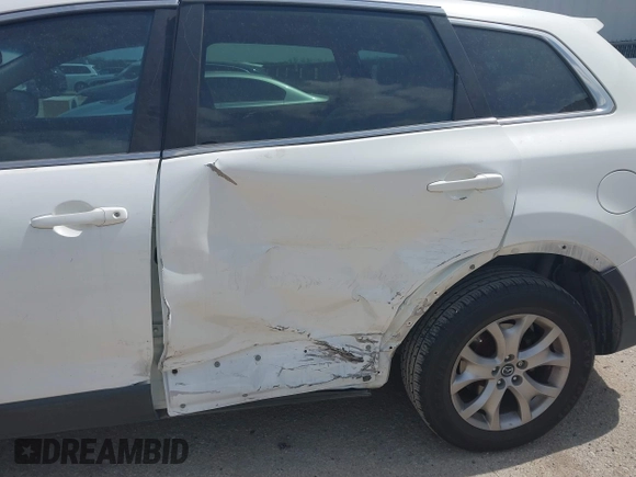 2015 Mazda CX-9 Sport with VIN JM3TB2BV7F0452071, listed as a IAAI auction lot 41895074 with 122,101 mi miles and . Bid and sale history available at carsss.com. Image 6.