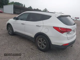 2016 Hyundai Santa Fe z VIN 5XYZU3LB0GG345673, wystawiony jako IAAI lot #42290297 z przebiegiem 75 701 mil mil oraz . Historia ofert i sprzedaży dostępna na DreamBid. Obrazek 3.