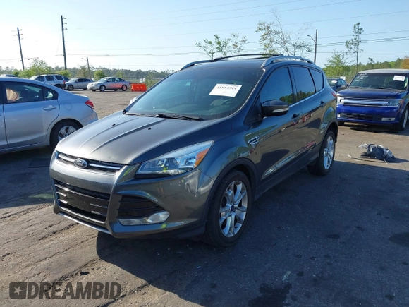 2016 Ford Escape Titanium with VIN 1FMCU9J94GUA63359, listed as a IAAI auction lot 41954514 with 94,315 mi miles. Bid and sale history available at carsss.com. Image 2.