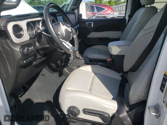 2022 Jeep Wrangler Unlimited Sahara with VIN 1C4JJXP60NW172103, listed as a Copart auction lot 60396415 with 29,960 mi miles and Salvage title. Bid and sale history available at DreamBid. Image 7.