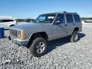 2001 Jeep Cherokee Sport with VIN 1J4FF48S41L595130, listed as a Copart auction lot 62123875 with 209,484 mi miles and Salvage title. Bid and sale history available at DreamBid. Image 1.