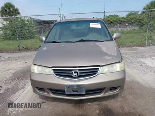 2004 Honda Odyssey EX-L z VIN 5FNRL18954B014748, wystawiony jako IAAI lot #42389048 z przebiegiem 136 176 mil mil oraz . Historia ofert i sprzedaży dostępna na DreamBid. Obrazek 6.