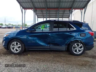 2021 Chevrolet Equinox LT z VIN 3GNAXKEVXML350994, wystawiony jako IAAI lot #42201733 z przebiegiem 31 429 mil mil oraz . Historia ofert i sprzedaży dostępna na DreamBid. Obrazek 14.